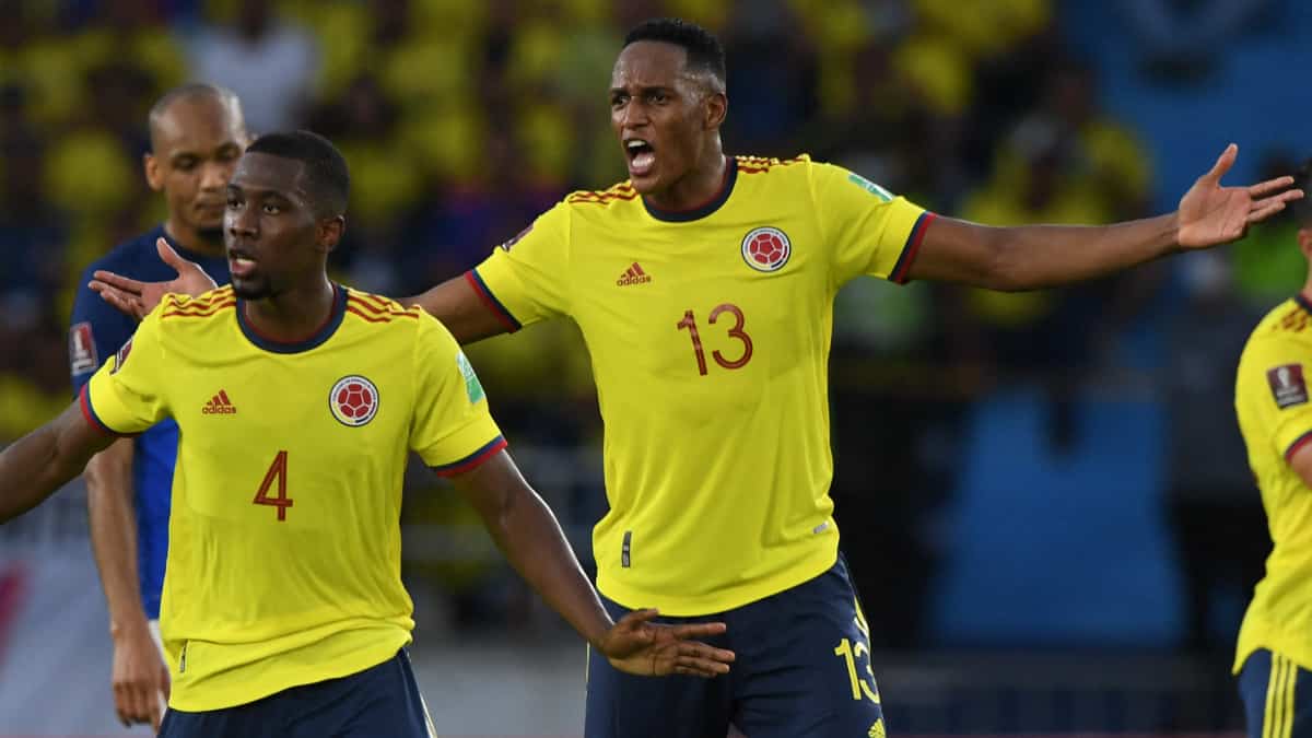 Carlos Cuesta y Yerry Mina