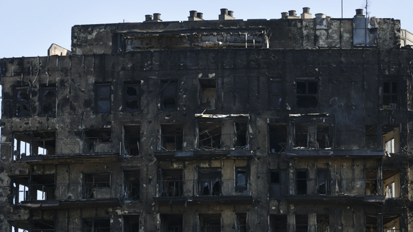 Al menos 10 muertos y varios desaparecidos en un voraz incendio en edificio de España Al menos 10 muertos y varios desaparecidos en un voraz incendio en edificio de España