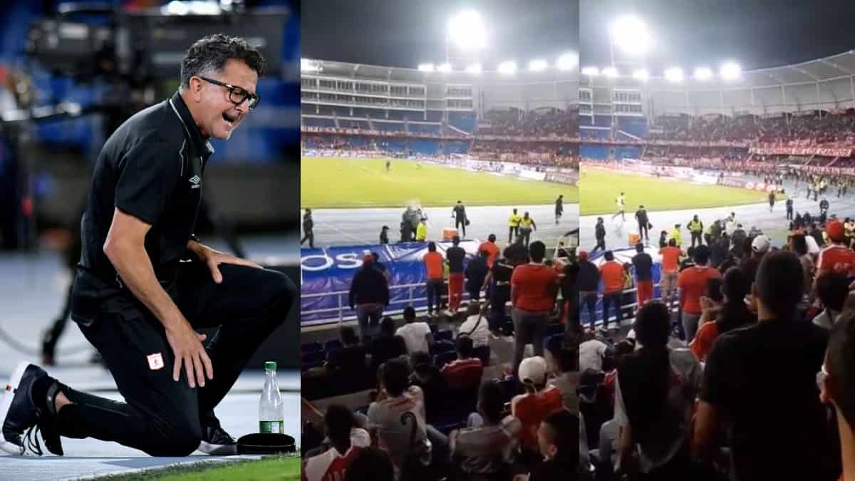 Juan Carlos Osorio y hinchas del América