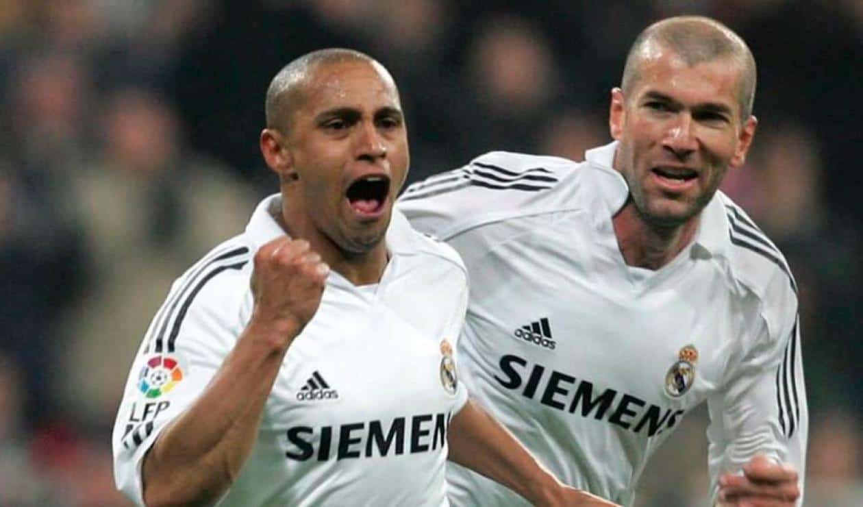 Roberto Carlos (izq.), leyenda de Real Madrid.