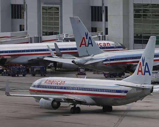 La estadounidense American Airlines fue una de las empresas multadas. Foto: AFP.