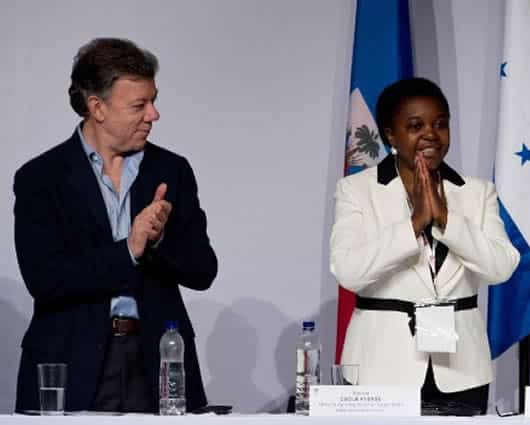 Santos y Kyenge en la Cumbre de Alcaldes y Mandatarios Afrodescendientes. Foto: AFP