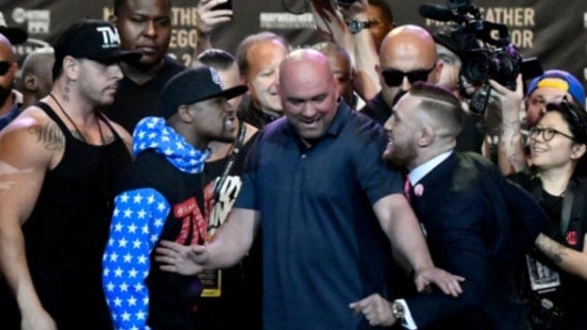Floyd Mayweather y Conor McGregor. Foto: Gene Blevins / AFP