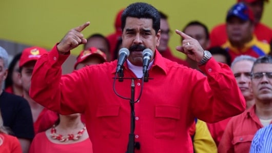Presidente Maduro asiste en compañía de su esposa al homenaje a Chávez. Foto: AFP.