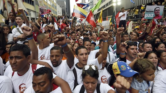 En las marchas estuvieron los líderes del gobierno y oposición de Venezuela. Foto: AFP.
