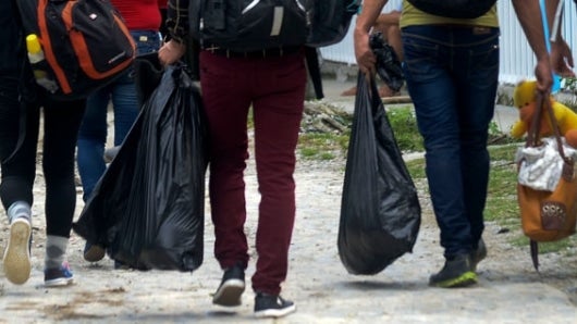 La Policía indicó en un comunicado que los extranjeros "pretendían viajar a la ciudad de Cali". Foto: AFP