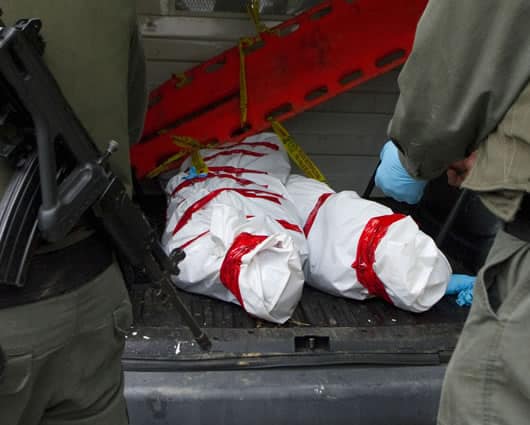 A los militares los acusan de homicidio en persona protegida, concierto para delinquir y falsedad ideológica en documento público. Foto: AFP.