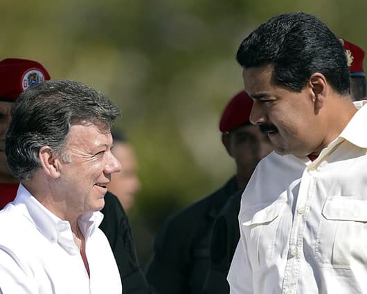 Los presidentes Juan Manuel Santos y Nicolás Maduro. Foto: AFP