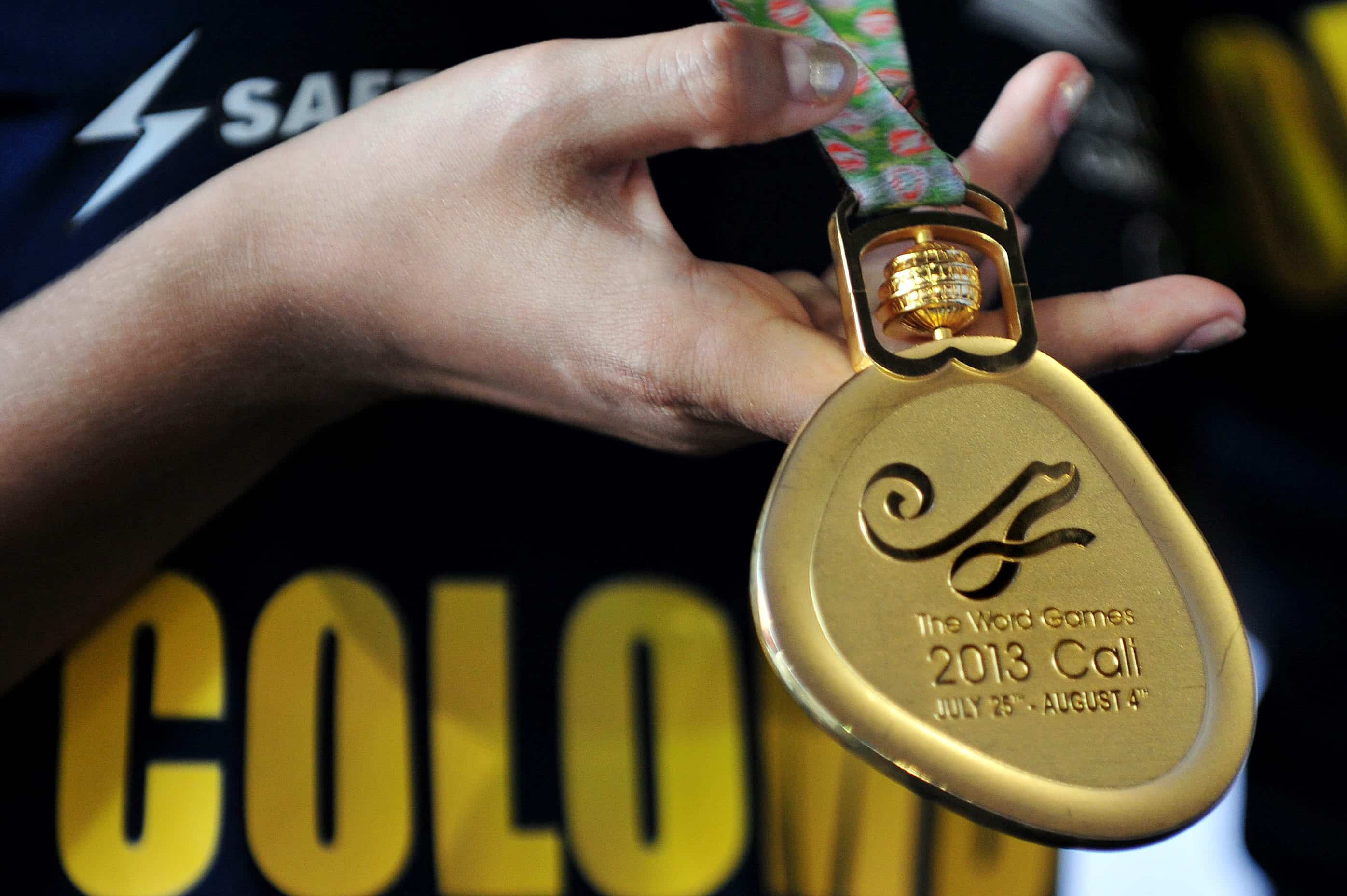 Ausencia de la letra 'L' en las medallas no traduce 'Mundo' sino 'Palabra'. Foto: EFE