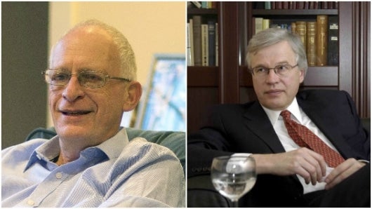 Oliver Hart y Bengt Holmström. Foto: EFE