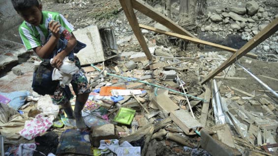 "Ya se restableció el servicio de agua, de energía y de gas", dijo Santos. Foto: AFP.