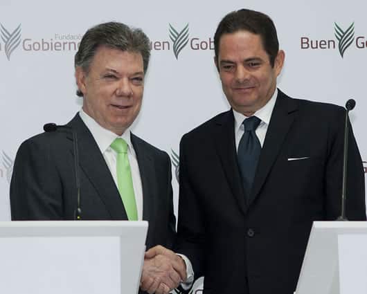 Juan Manuel Santos en compañía de Germán Vargas Lleras. Foto: AFP.