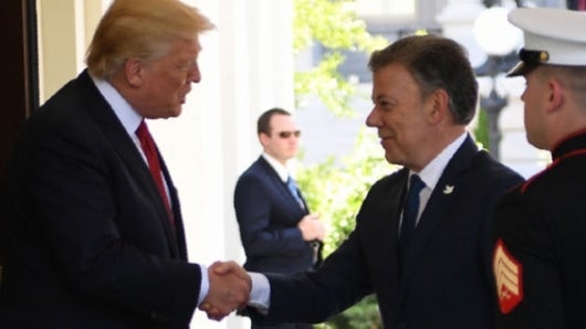 El presidente estadounidense, Donald Trump, y Juan Manuel Santos. Foto: AFP