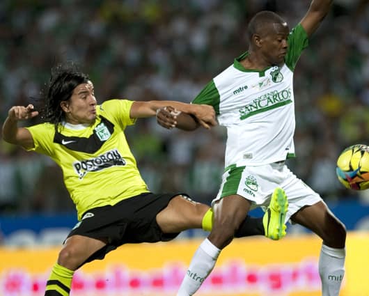 El Nacional tuvo el dominio del balón pero el Cali dio los golpes. Foto : AFP