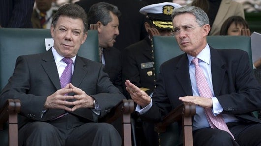 Presidente Juan Manuel Santos y senador Álvaro Uribe Vélez. Foto: AFP