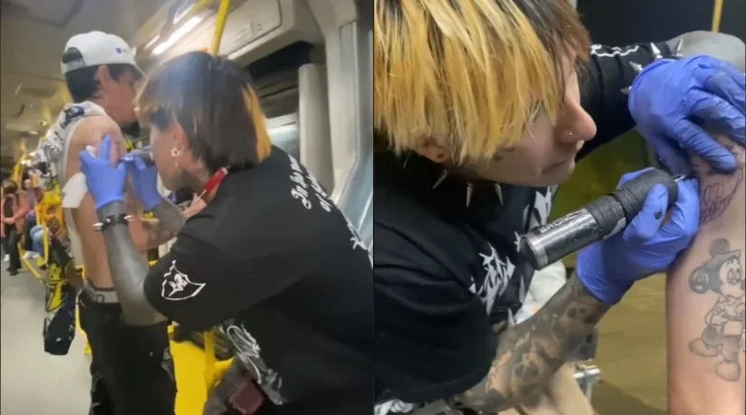Joven tatúa pasajeros en estación de TransMilenio.