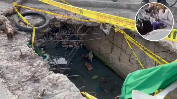 Motociclista y su acompañante cae en enorme hueco en calle de Barranquilla Motociclista y su acompañante cae en enorme hueco en calle de Barranquilla