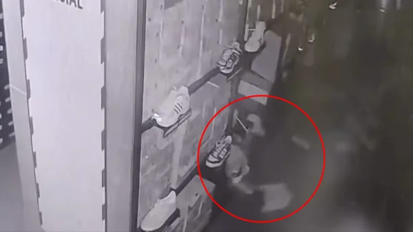 En video: rompieron un muro y robaron una tienda de Adidas en Bogotá