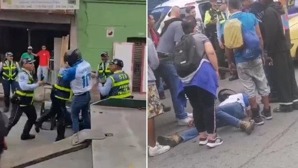 VIDEO | Hombre quedó inconsciente tras aparente golpiza de agentes de Tránsito en Cali VIDEO | Hombre quedó inconsciente tras aparente golpiza de agentes de Tránsito en Cali