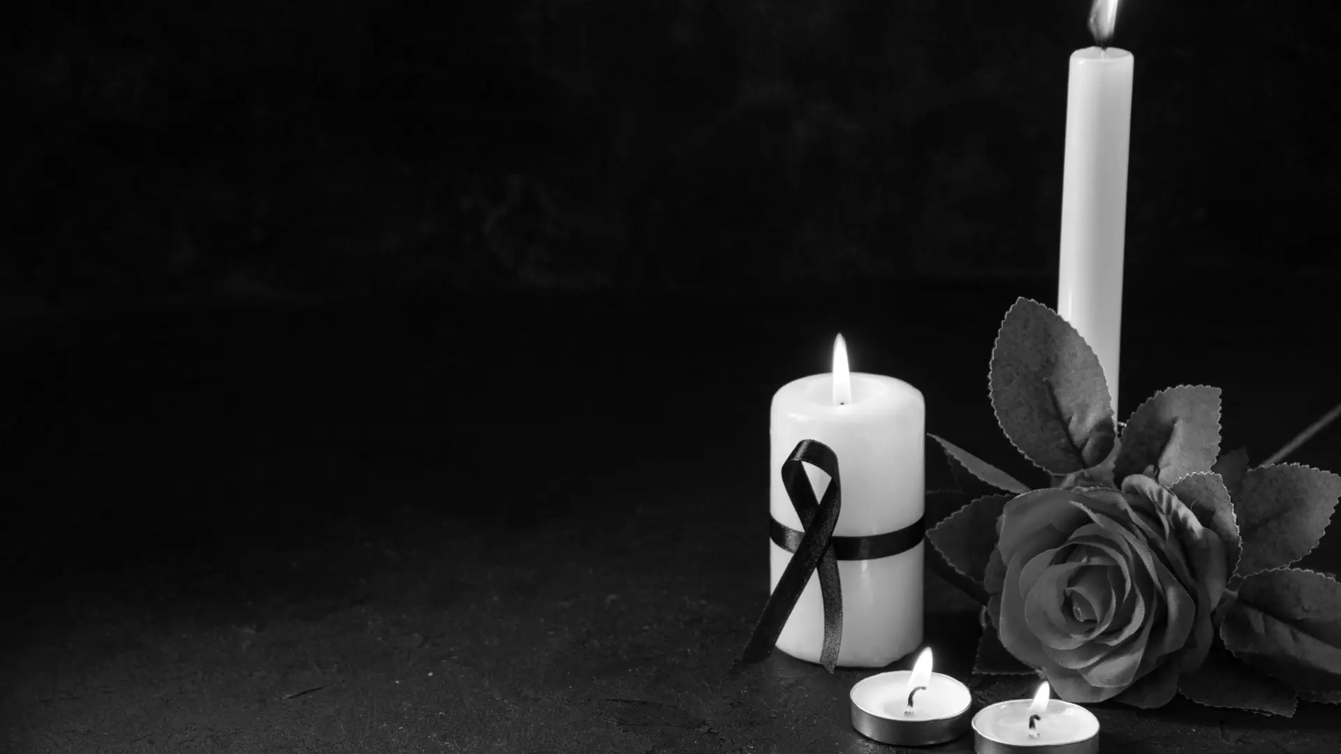 Muerte luto velas rosas