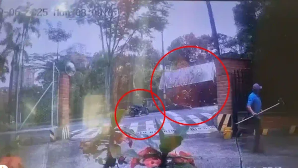 En video: motociclista se salvó milagrosamente de ser aplastado por un camión en Medellín