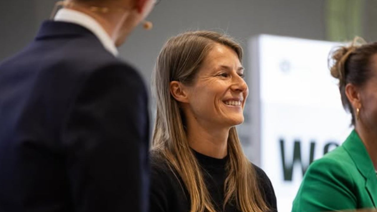 Marie Louise Eta, the first female coach of a professional men's team