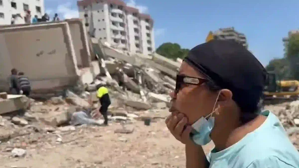 Historias de la tragedia en Venezuela: espera todos los días el silbido de su sobrino en el edificio que lo sepultó
