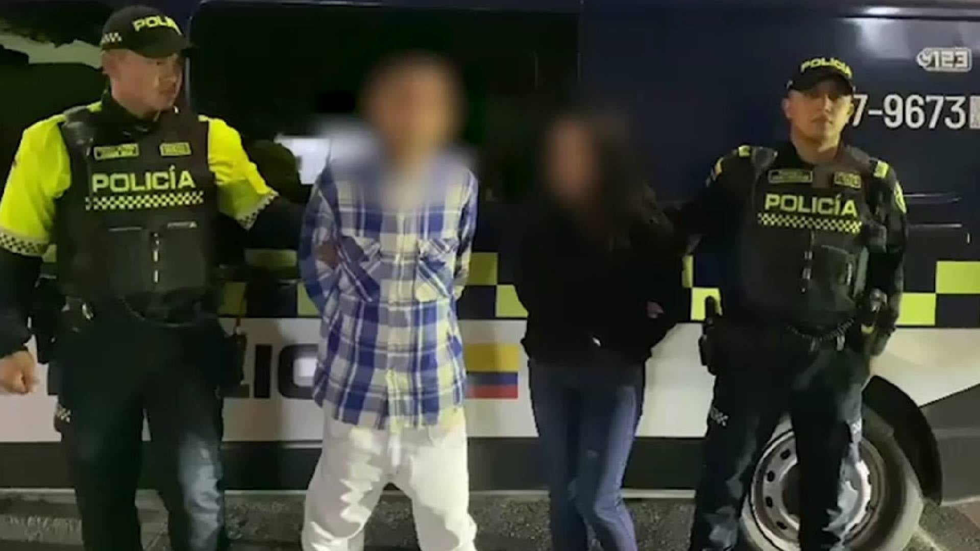 Pareja de agresores en Transmilenio